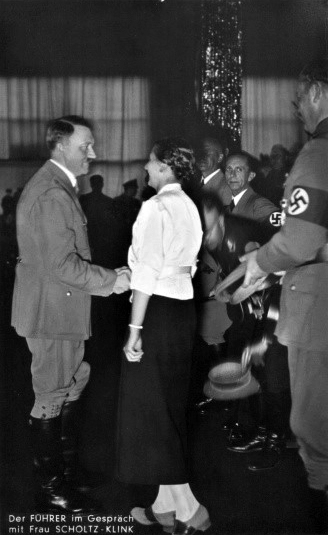 Adolf Hitler and Gertrud Scholtz-Klink, the head of the NS-Women's League, shaking hands at the Nuremberg rally for the Frauenschaftstagung